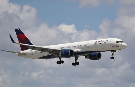 Passenger arrested on Delta flight after cutting himself and a flight attendant, authorities say